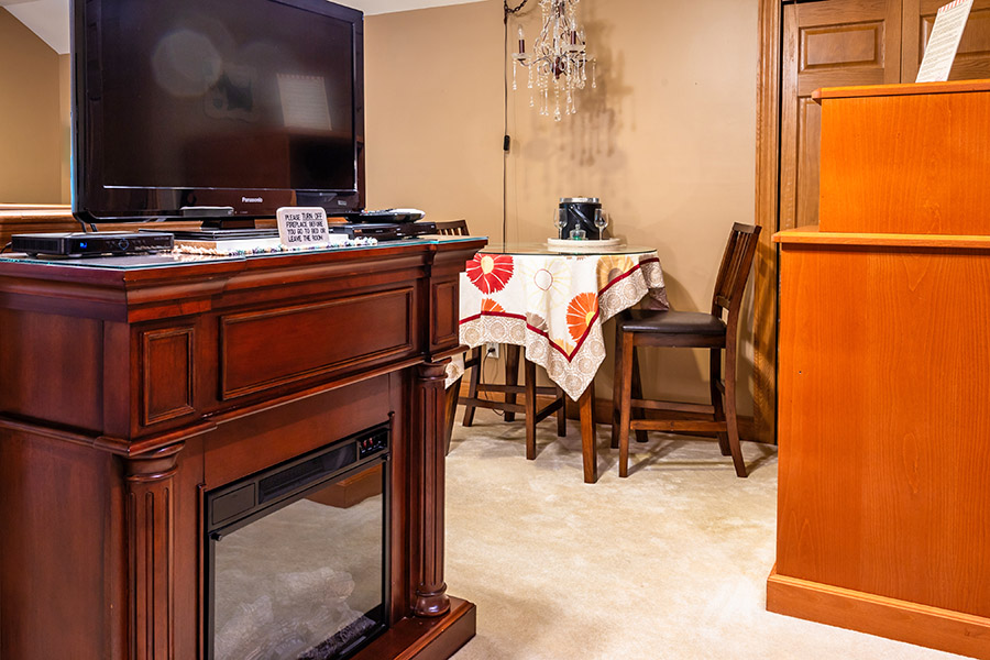 Antique Room fireplace and dining table