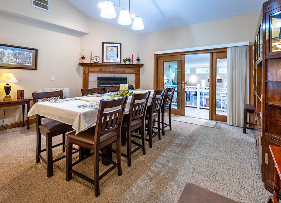 dining room with view into game room